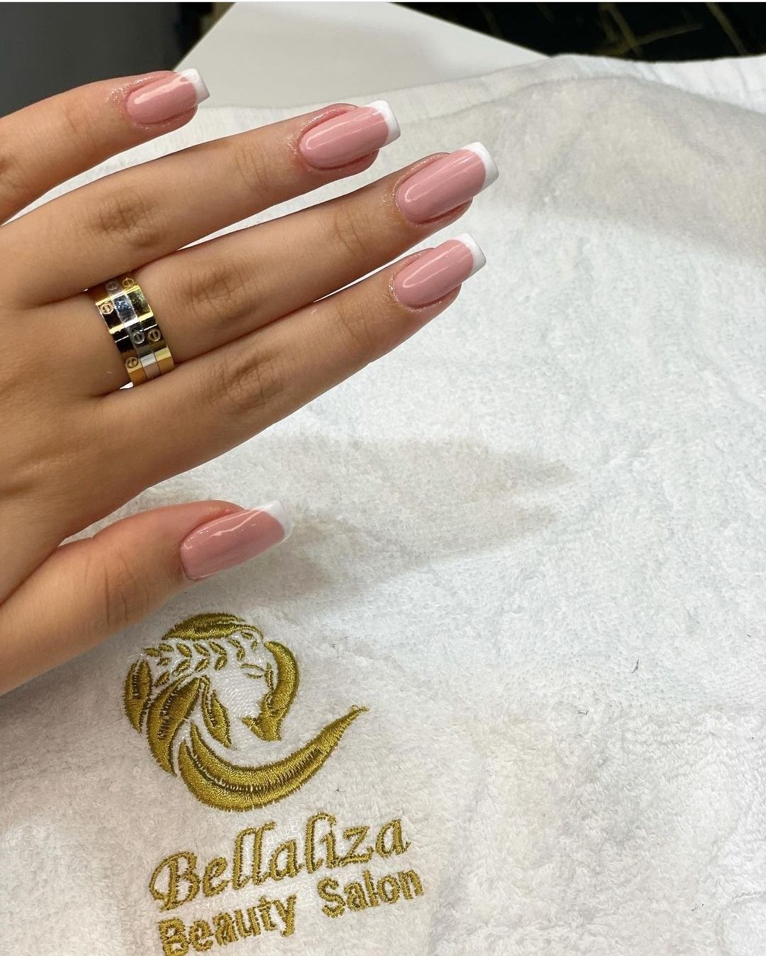 Fresh French manicure on a Bellaliza Beauty Salon towel